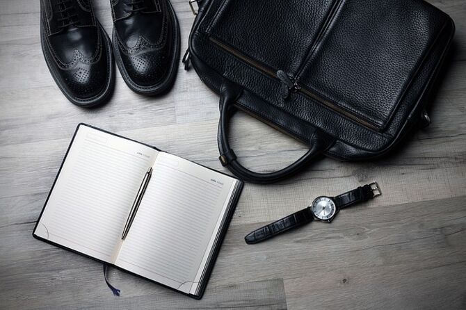 Shoes, briefcase, watch and diary