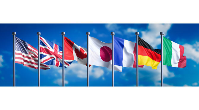 Flags of several G7 countries illustrates an article about economic growth