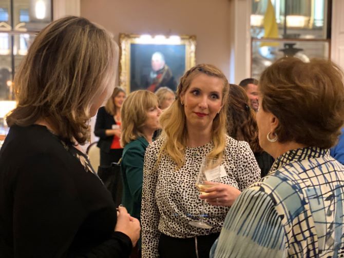 Image of group of women networking at event