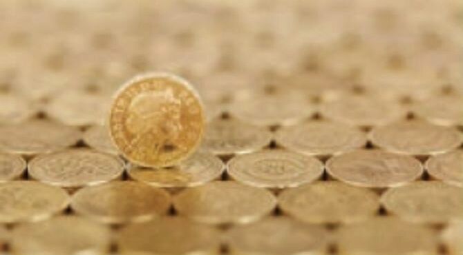 Pound coins illustrate a 14 Feb 2017 article about rising UK inflation rates