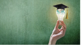 Image of lightbulb with globe and mortar board on top