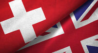 United Kingdom and Switzerland flag together relations textile cloth fabric texture