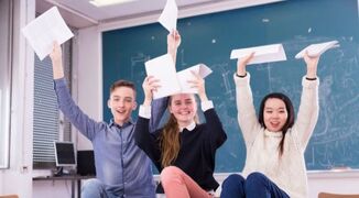 students-celebrating-exam-results