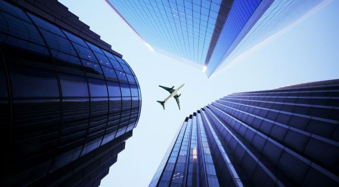 Buildings-with-aeroplane-overhead